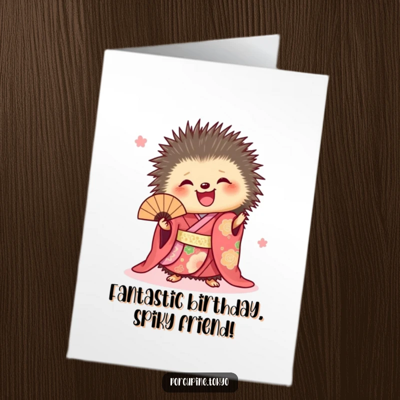 Funny Free Printable Birthday Card: Porcupine in vibrant kimono joyfully holding a fan, a humorous downloadable birthday greeting.