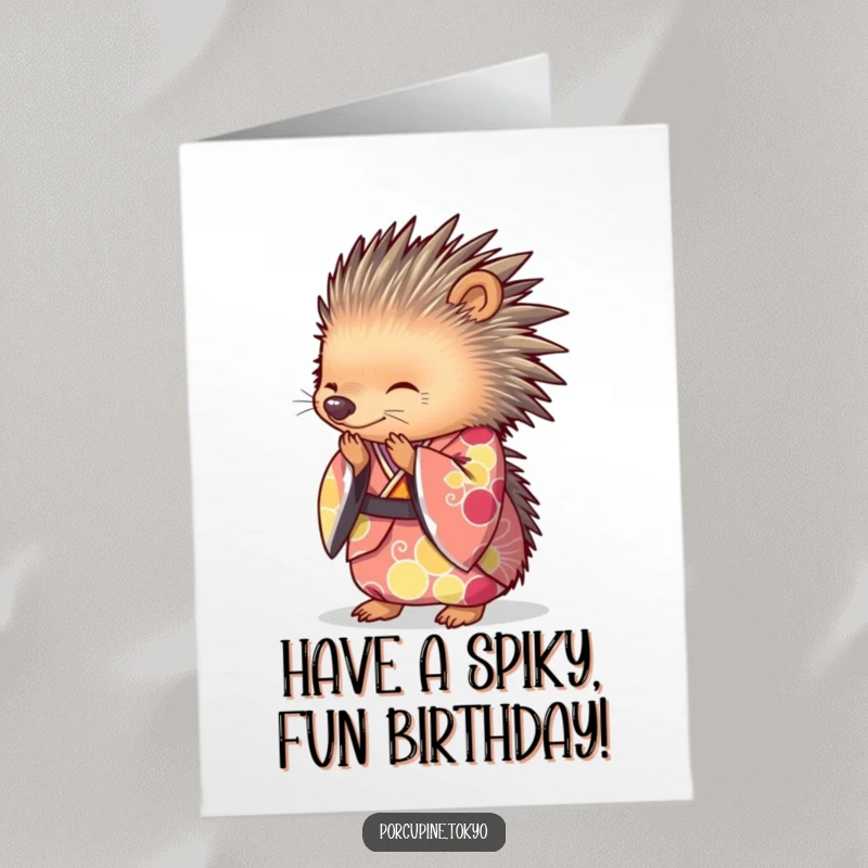 Funny Free Printable Birthday Card of a porcupine dressed in a vibrant kimono, performing a graceful bow.